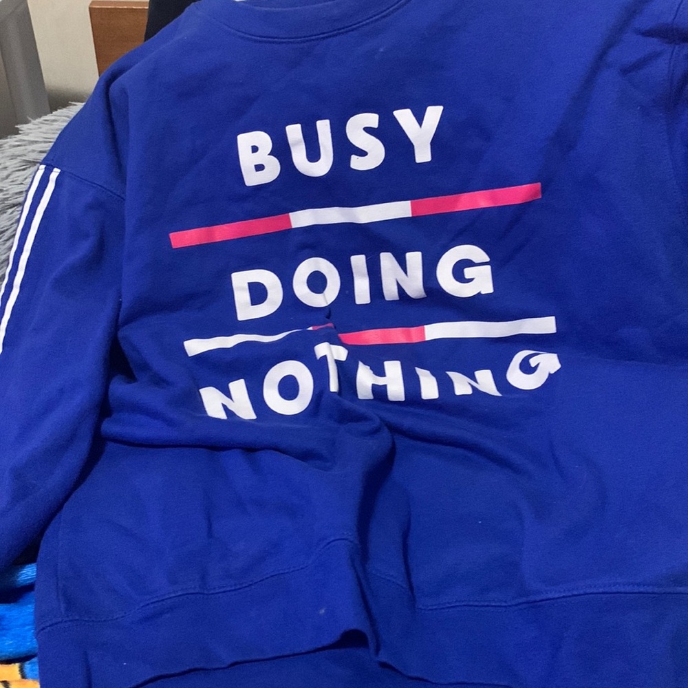 It’s blue it’s a sweater very comfy